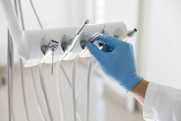 Professional Tooth Extraction technician working in Brownsville, TX